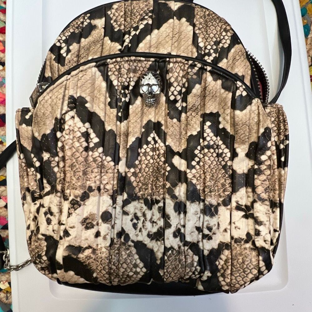 Betsey Johnson Slithering Skull backpack w/a pleated jumbo snake finish Pink Int